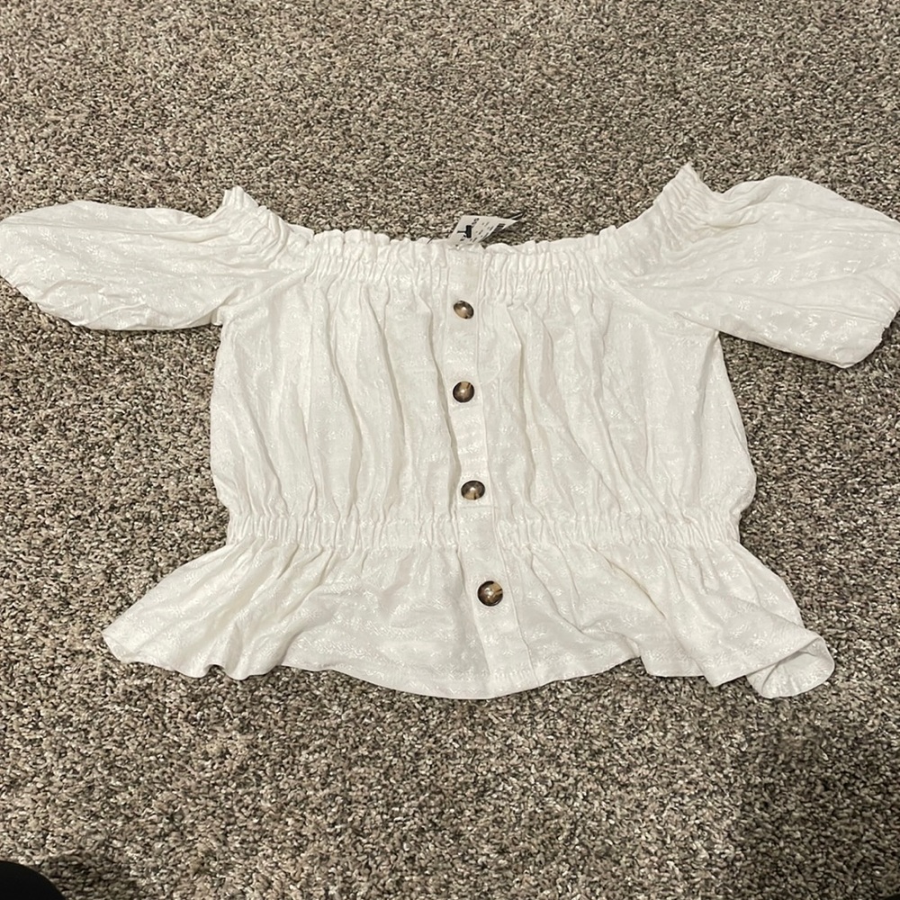White peplum top